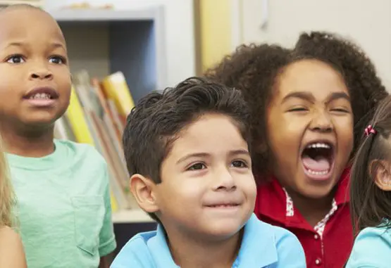 Kids smiling at Watson