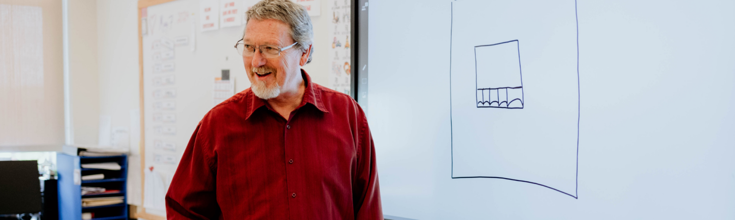 special education math teacher pictured in his classroom