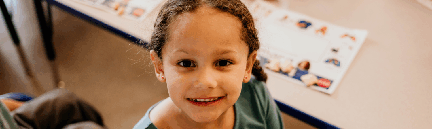 LEAP inclusive preschool student in her classroom - Watson Institute