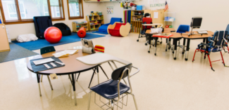 a special education classsroom is set up with centers to help students work independently during scheduling gaps - Watson Institute
