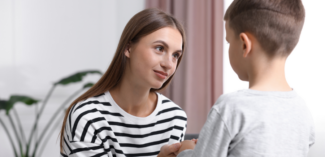 parent communicating with upset child using receptive language interventions - Watson Institute