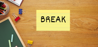 student's desk includes a "Break" index card used to prevent escalating behaviors or non-compliance - Watson Institute