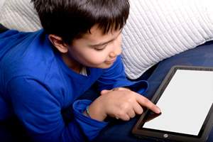 child using tablet device