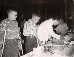 salk administering vaccine