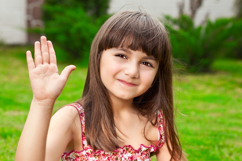 Girl waving