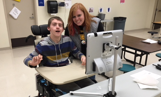 Watson Institute student, Tyler, and Speech Therapist, Jackie Logan at the School Store. 