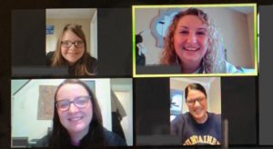 Teachers and students faces are pictured during a video chat