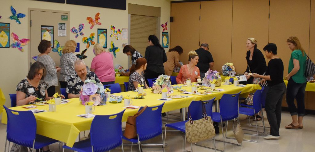 families of students at Watson gather for a parent support group brunch in the decorated cafeteria