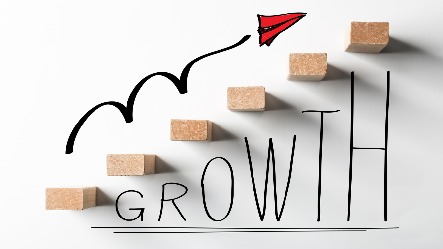 graphic that reads "growth" with blocks going in an upward slope with an arrow
