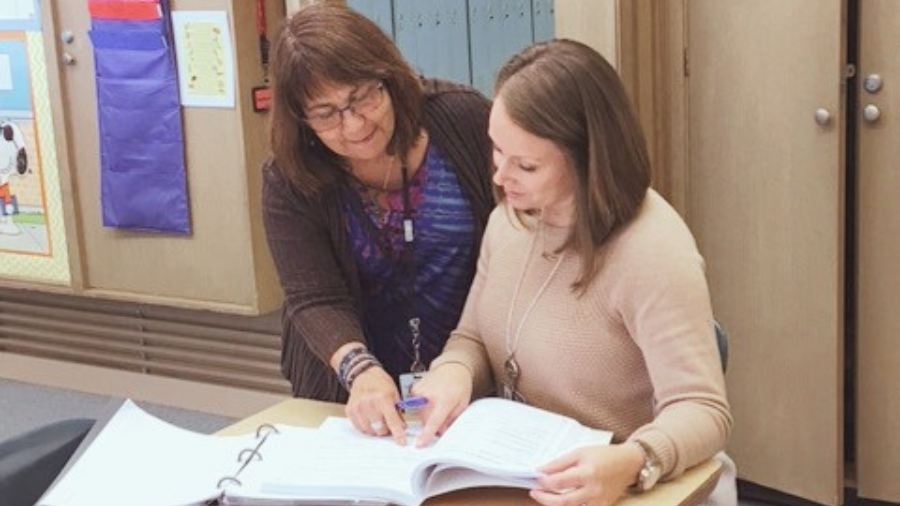 Educational Consultant meets with a special education teacher to offer insights.