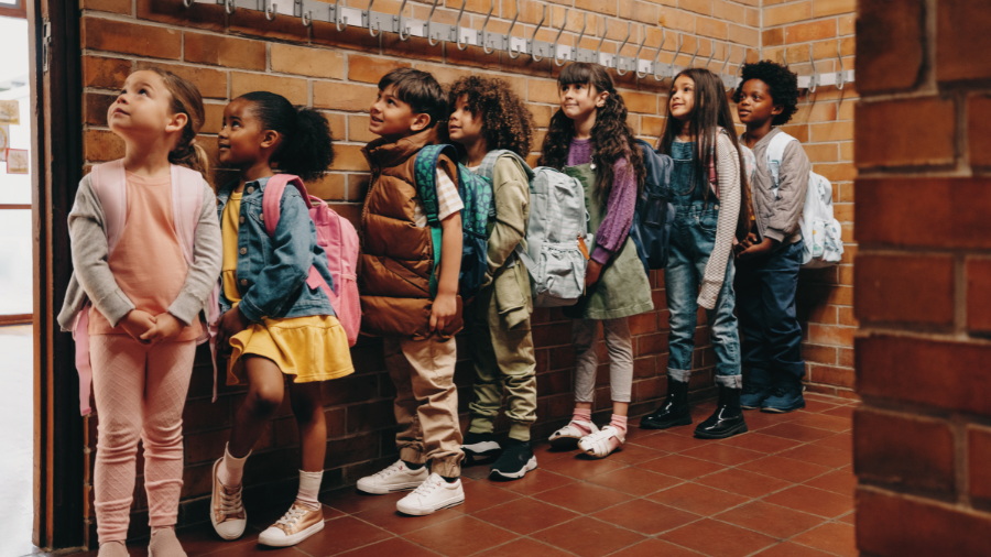 students waiting patiently while transitioning between activities at school - Watson Institute
