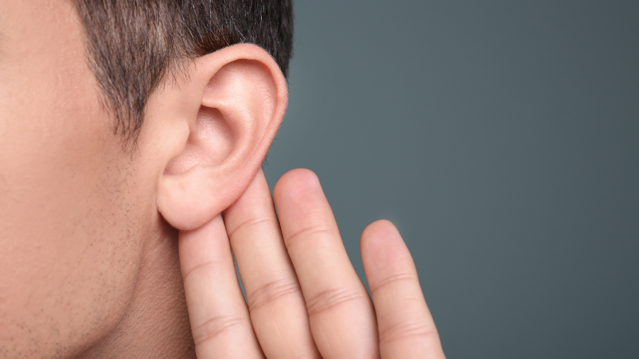 a student's ear represents active listening and the social skills necessary to show peers that they are listening during conversations - Watson Institute