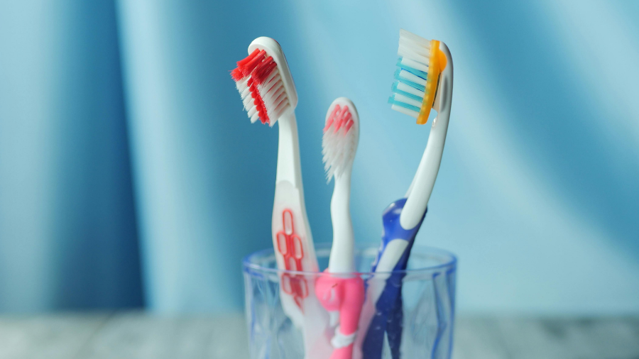different toothbrushes shown to provide structured choices if your child has toothbrushing sensitivities - Watson Institute