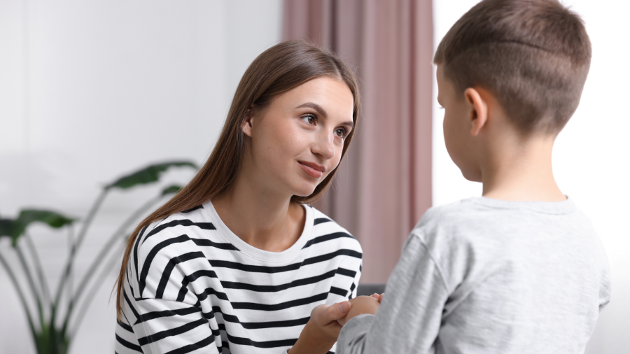 parent communicating with upset child using receptive language interventions - Watson Institute